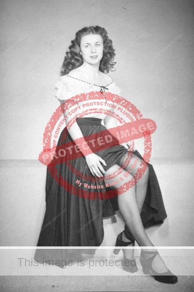 Anne McKeever modeling Embassy Shoes. ca 1949. Credit: Auckland Archive.