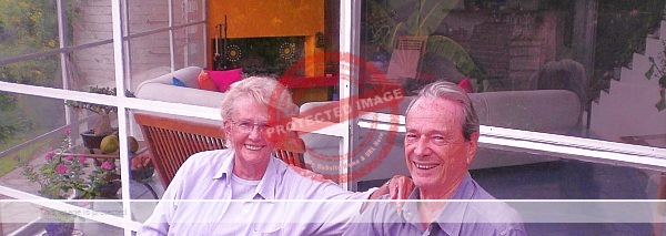 Russell Bayly relaxing at home with his neighbor Tad Davidson (Lady Mary Fleming), August 2008. Photo by Tony Burton.