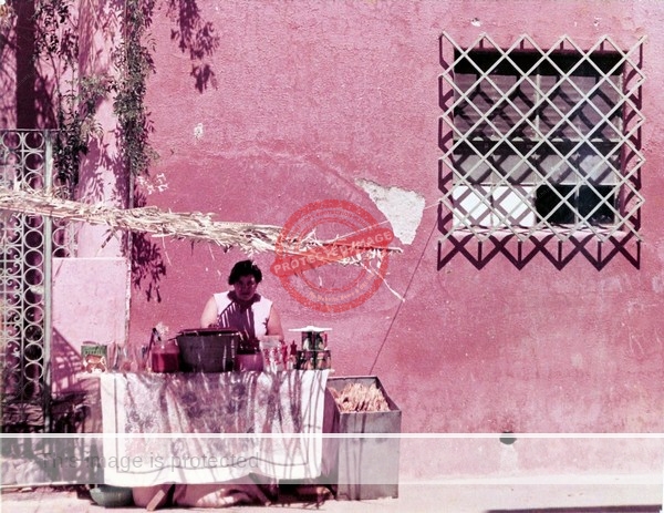 Bert Miller. ca 1973. Street vendor in Chapala.